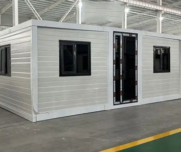 Flat top double wing expansion house